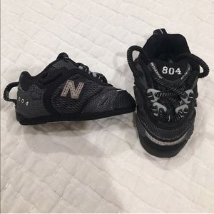 Black New Balance Crib shoes